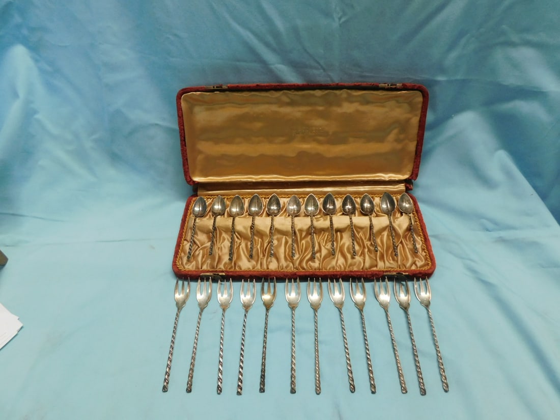 Sterling Demitasse Spoons & Forks: Sterling Demitasse Spoons and Forks by Dominick & Haff, includes: red velour boxed set of twelve 4 1/8" spoons, and twelve matching 5 1/4" three prong forks without a box; all with rope twist handles,