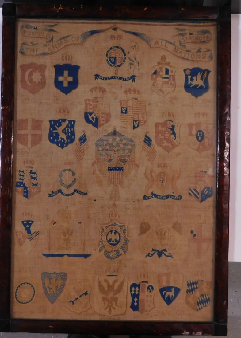 "Arms of All Nations" Textile: "Arms of All Nations" Textile printed cloth - "In Union is Strength", the US Eagle and Flag is surrounded by the Coats of Arms of 27 nations; sight 23 1/2" x 16", frame 25 1/2" x 18". CONDITION: Heavi