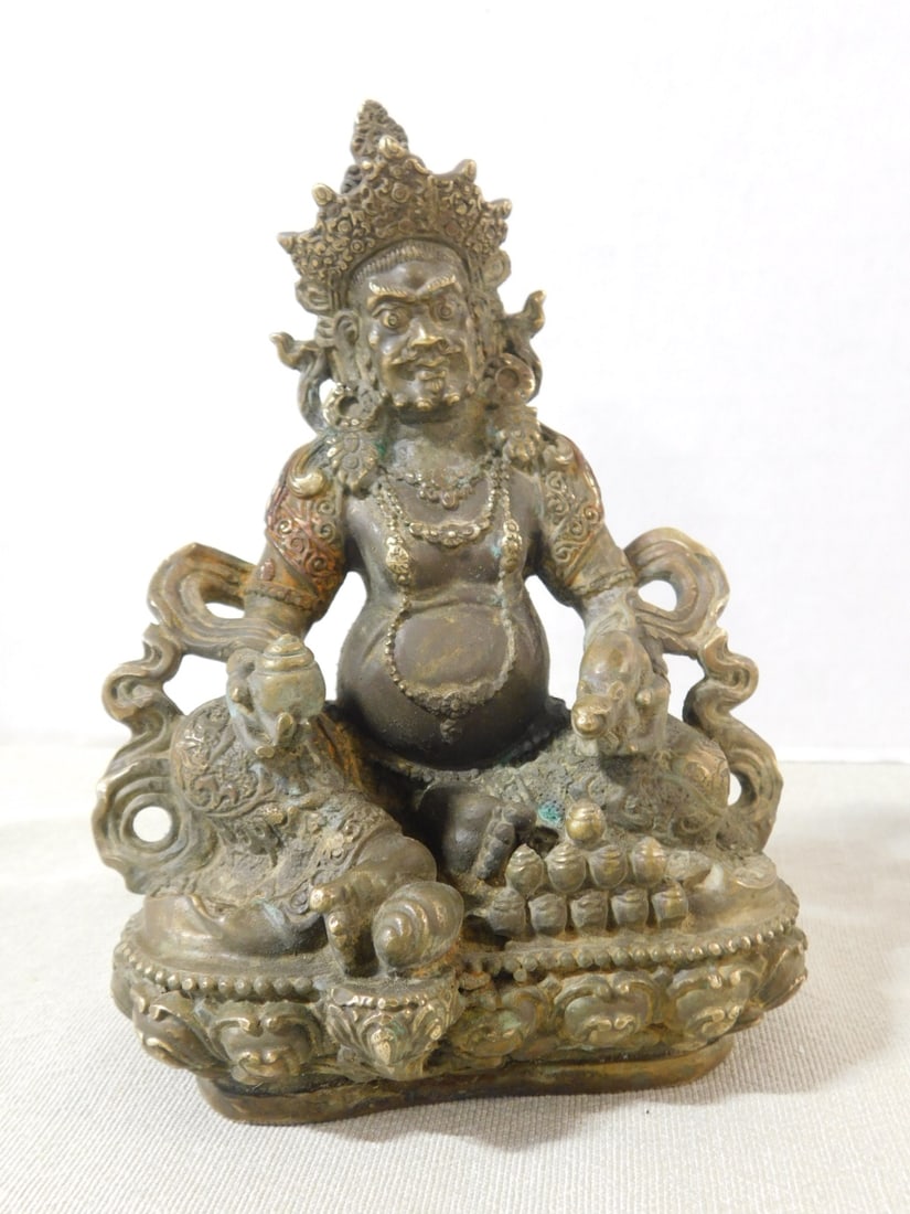 Bodhisattva Bronze Tibet: Bodhisattva Bronze Tibet Jambhala temple figure, signed on base, hgt 6", 20th c. CONDITION: Tarnished