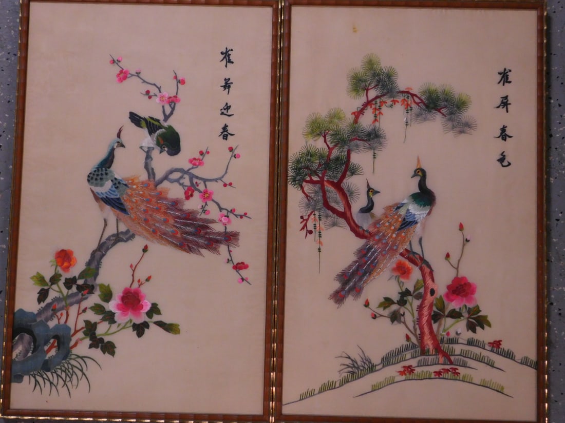 Pr Japanese Framed Embroideries: Pair Japanese Framed Embroideries, silk, peacocks in garden settings, with script on upper right, bamboo frames 23 3/4' x 14 3/4", 20th C. CONDITION: VF.