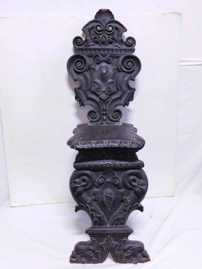 Italian Renaissance Sgabelle Chair: Italian Renaissance Sgabelle Chair, 19th C, walnut with carved serpent, medallions and scrolls, 42". CONDITION: Loss to part of shell crest and left edge beneath scroll, screw added to seat.
