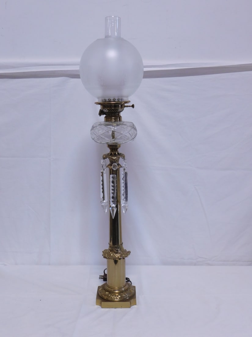 Victorian Fluid Lamp: Victorian Fluid Lamp, brass column form holding 7 1/2"long cut glass spears and a cut glass font; Duplex E.M. & Co. brass wick fittings, replace frosted and acid etched glass ball shade and chimney el