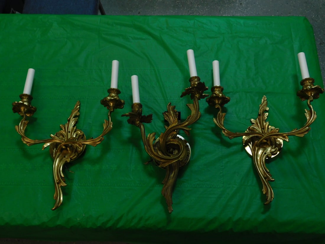 3 Rococo Wall Sconces: Three Rococo Wall Sconces, brass, two light foliate form, electrified, late 20th C, 18" x 14" x 4 1/2". CONDITION: Very good. No issues identified.