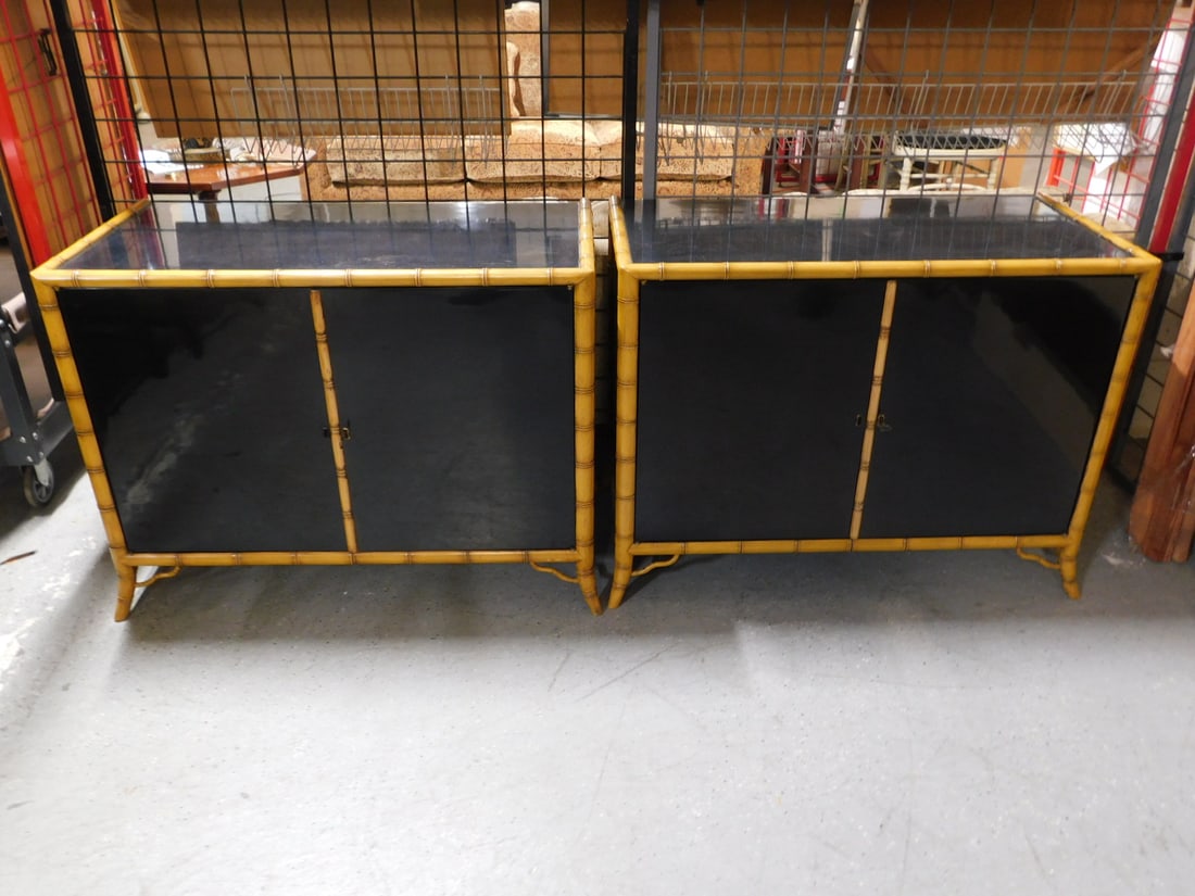 Pr Designer Cabinets: Pair Designer Cabinets, black lacquered with bamboo trim and feet, two locking doors with interior shelf, 21 st C, 20" x 39 1/2" x 30". CONDITION: Good for age. No issues identified.