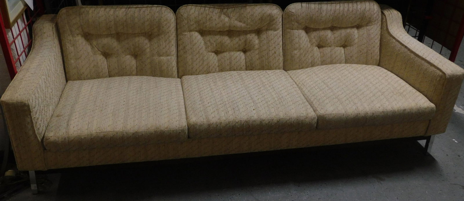 MCM Sofa: MCM Sofa, no maker's info available, patterned and partially tufted cream cloth upholstery, square tube chrome legs, 82"l, 32"d, 25"h. CONDITION: Light useage.
