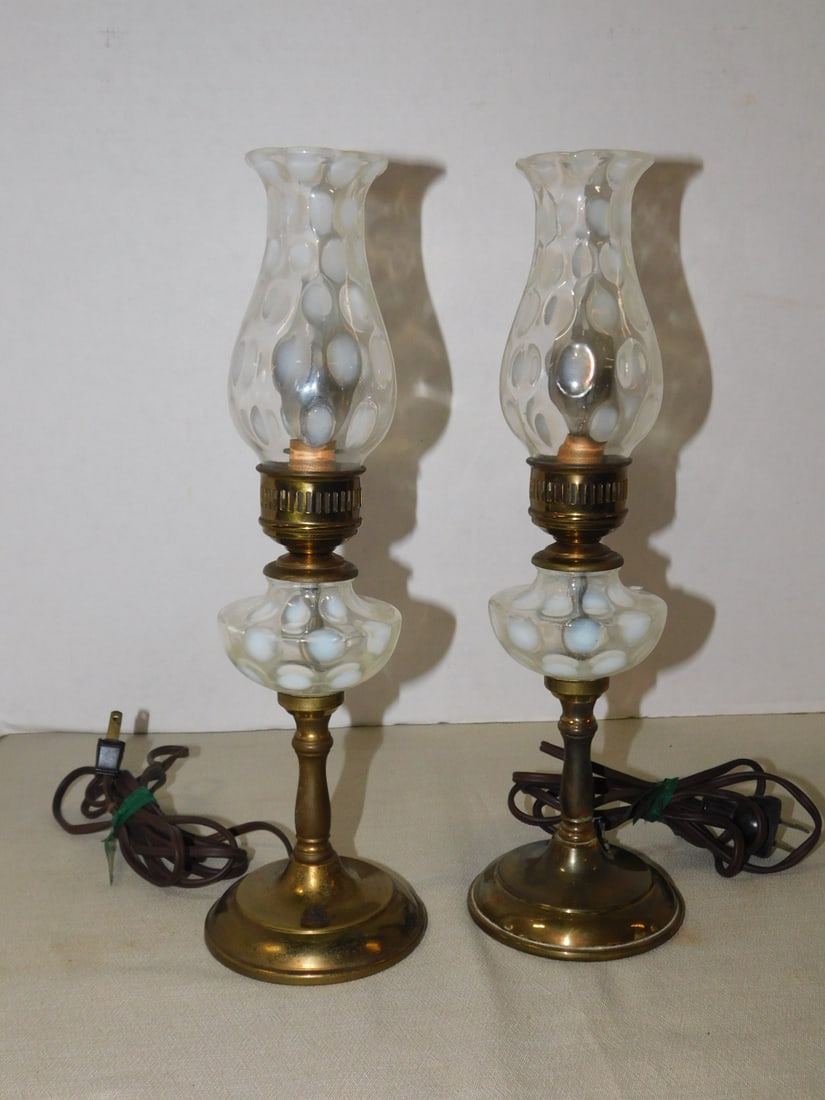Pr Opalescent Glass Lamps: Pair Opalescent Glass Lamps, opalescent coin dots on clear glass, brass base and fittings, electrified, mid 20th C, 13 3/4"h. CONDITION: Very good, tarnished brass.