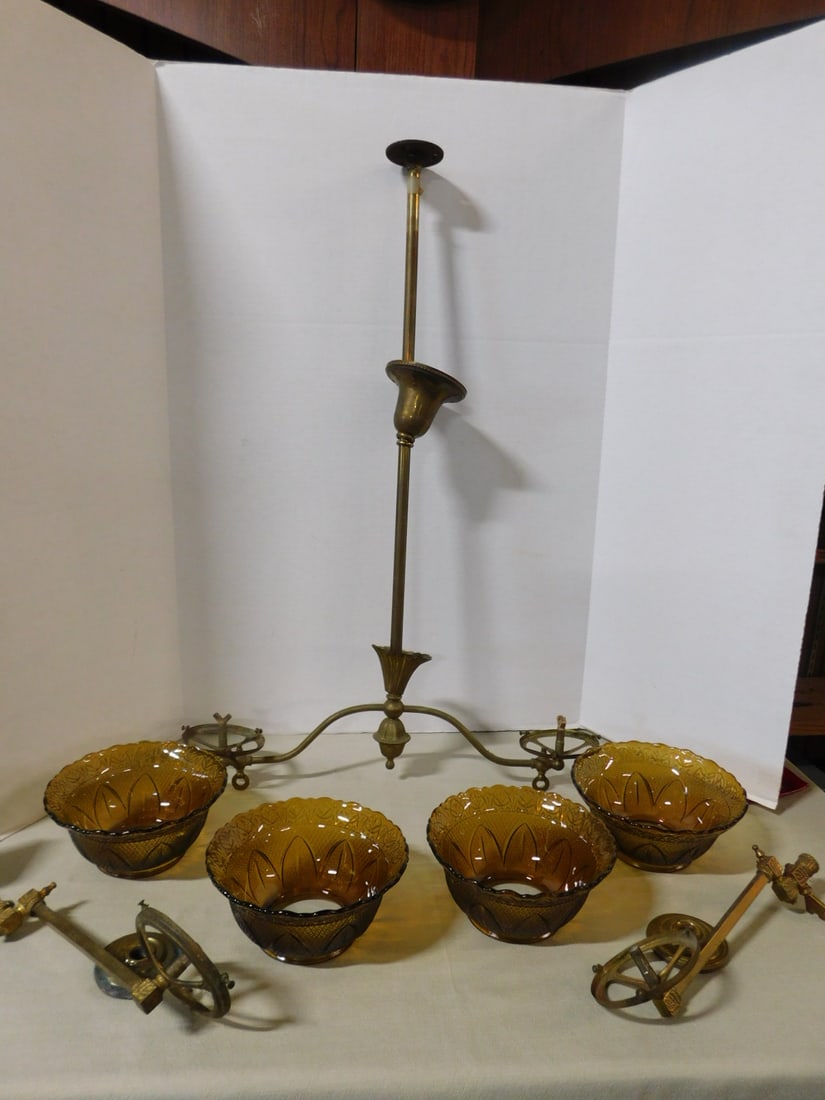 Gas Chandelier & Wall Lamps: Gas Chandelier and Wall Lamps,Victorian, brass, includes: 32" x 24" chandelier, a pair of 12" wall bracket lamps, all with matching 7 1/2" molded amber glass shades, late 19th C. CONDITION: Tarnished.