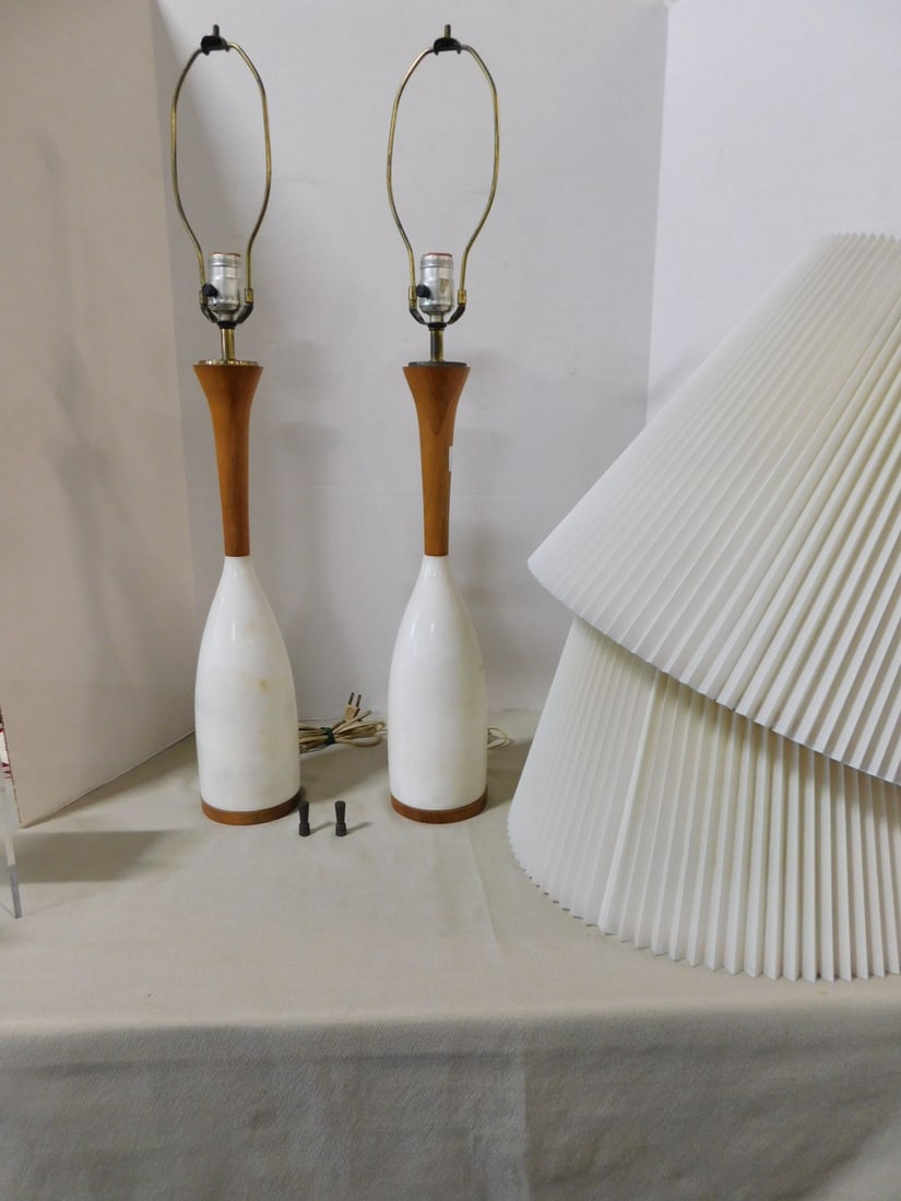 Pr MCM Marble Lamps: Pair MCM Marble Lamps, white marble in bottle form with turned teakwood bases and tops, pleated shades, circa 1960 - 70s, overall 33"h. CONDITION: Light marble spotting.