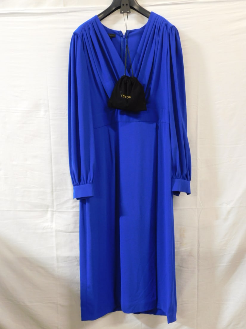 Blue Escada Dress Size 40: Blue Escada Dress Size 40. Cobalt blue dress, triacetate/polyester blend, long sleeves, zips up the back, draped V-neck, buttons at the cuff, includes a pouch with matching sash to tie at the waist. I