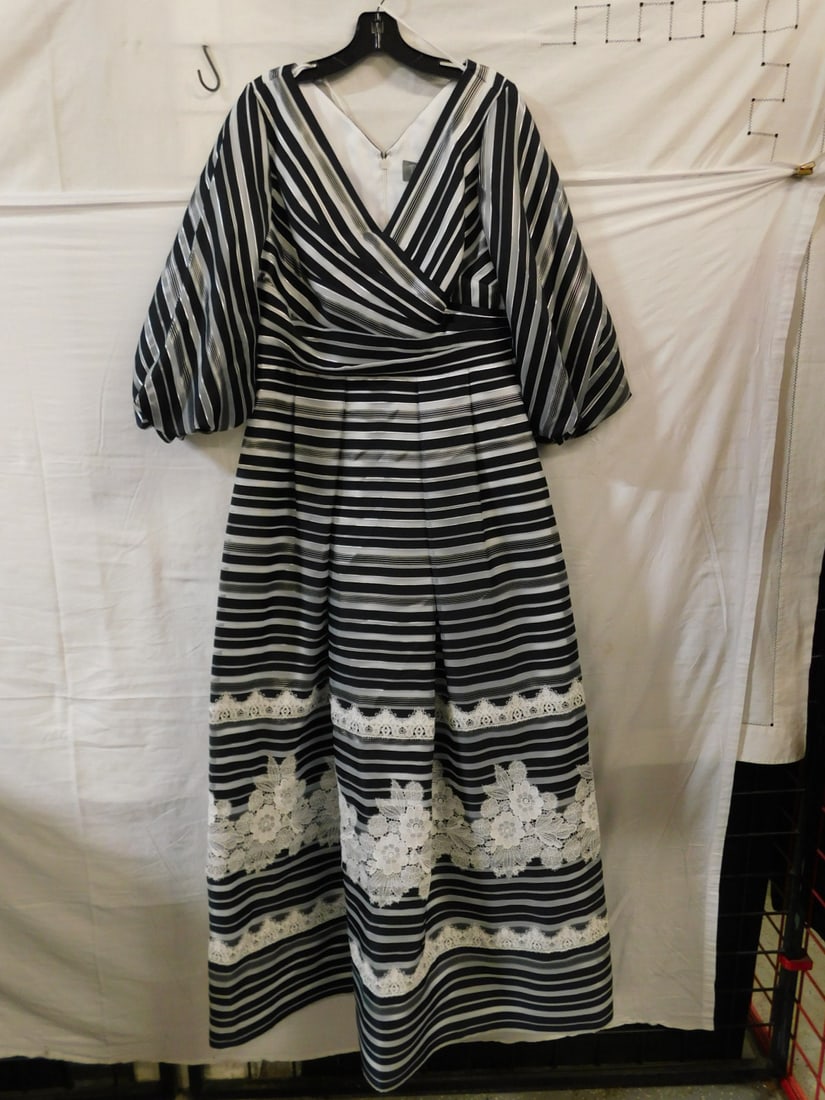 Theia Faux Wrap Striped Evening Dress Sz 12: Theia Faux Wrap Striped Evening Dress Sz 12. Theia faux wrap evening dress with black, silver and sheer organza stripes with white lace embellishments, bishop sleeves, v-shaped open style back, pleate