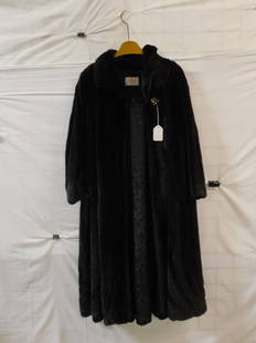 Mink Fur Coat: Mink Fur Coat, full length mink, dark brown, vintage, by Patchinn Furs, back 19", sleeve 24", length 50". CONDITION: Good.