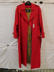 Classic Burberry Trench Coat: Classic Burberry Trench Coat,London, 1980s vintage, red, double breasted, waist belt buckle, buckle cuffs, button pockets, signature plaid wood lining, approx. 52 1/2" x 18 1/2". CONDITION: Very good,