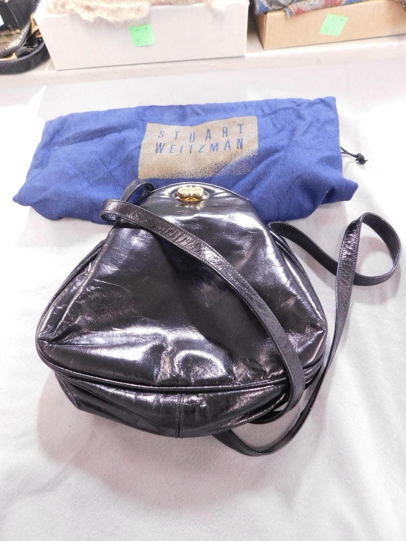 Stuart Weitzman Shoulder Bag: Stuart Weitzman Shoulder Bag, black patent leather, made in Spain, gold tone double ball turning clasp and interior label, 9" x 10', includes: original dust bag. CONDITION: Light usage.