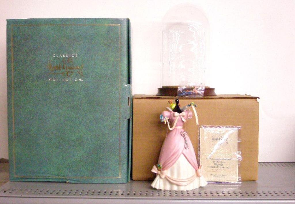 Walt Disney Classics Collection Figurine: Walt Disney Classics Collection Cinderella "A Lovely Dress For Cinderella" 7" porcelain figurine with glass dome & box, limited edition #4533/5000. CONDITION: Very good with no damage.