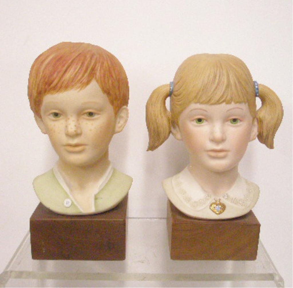 Cybis Jeremy & Jessica Busts: Cybis porcelain 7" x 4 1/2" #492 Jeremy & 7" x 4 1/2" Jessica bust figurines mounted on wood bases, overall sizes are 8 1/2" x 4 1/2". CONDITION: Both are very good with no damage, Jeremy is loose on 