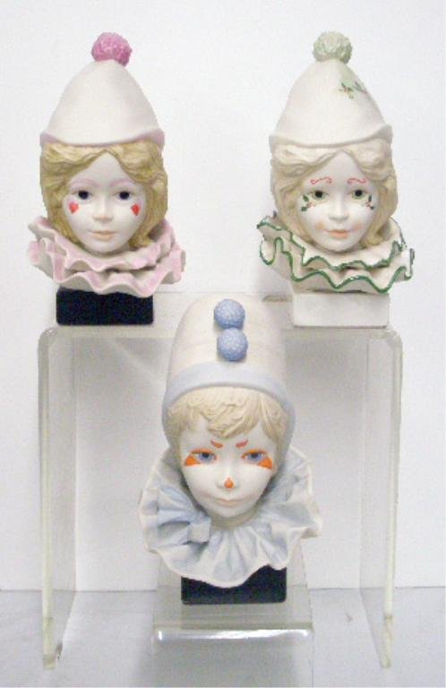 Cybis Funny Face & Valentine Clown Busts: Cybis porcelain 7 1/2" x 5" Funny Face Clown, 8" x 5" #5015 Valentine Clown & 8" x 5" #5015 Valentine Clown with Holly, bust figurines, mounted on wood bases, overall sizes are 9" x 5" & 9 1/4" x 5". 