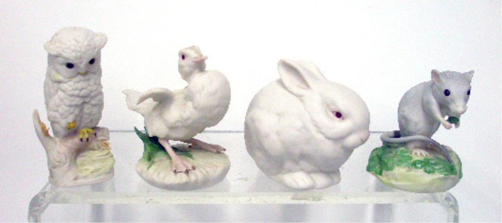 Cybis Animal Figurines: Lot of four Cybis porcelain animal figurines, 4 1/4" #334 Baby Owl, 4" x 3 1/2" #361 Duckling, Baby Brother, 3 1/2" x 3 3/4" #611 Bunny, Mr. Snowball & 3 1/2" x 3" Deer Mouse In Clover. CONDITION: All