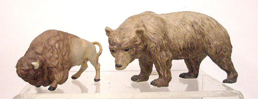 Cybis Buffalo & Black Bear Figurines: Cybis porcelain 3" x 5 1/4" #640 Buffalo & 4" x 7 1/2" #6095 Black Bear figurines. CONDITION: Both are very good with no damage.