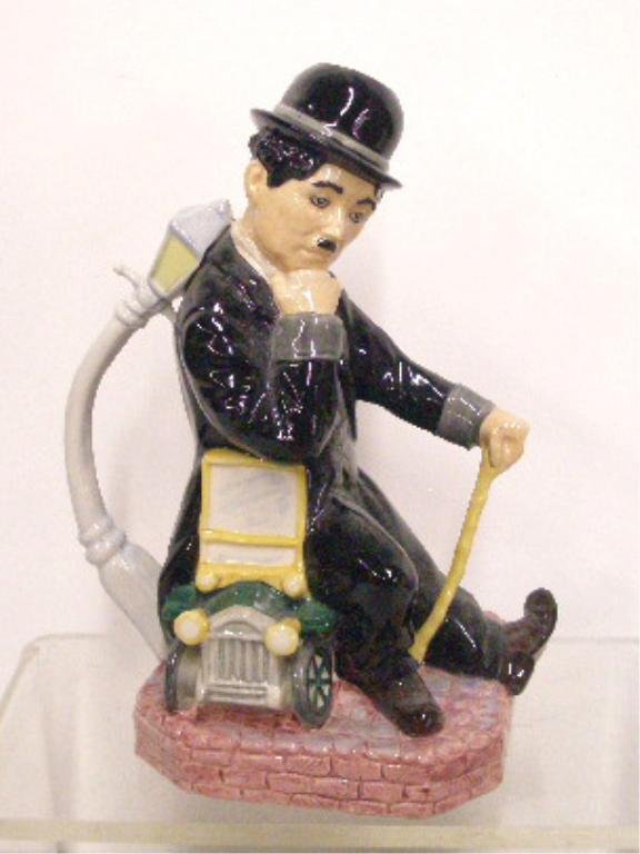 Staffordshire Charlie Chaplin Toby Jug: Staffordshire porcelain Charlie Chaplin "The Prince of Clowns" 8 3/4" toby jug modeled by Andy Moss, limited edition #54. CONDITION: Very good with no damage.