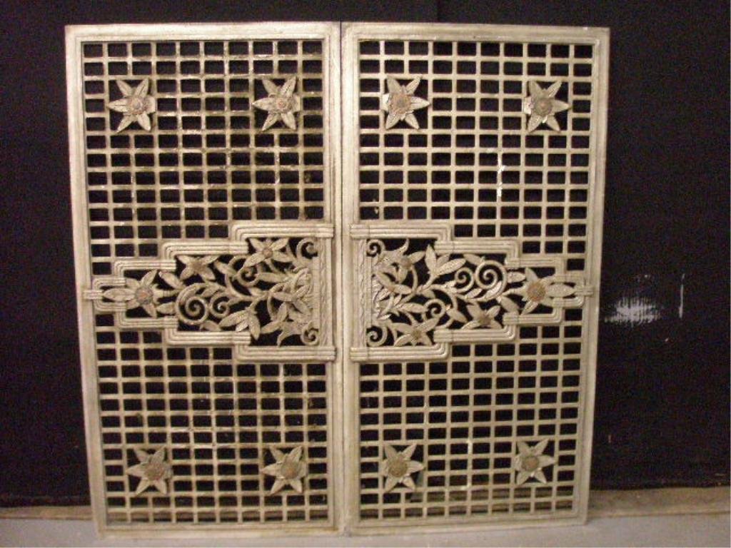 Pr Art Deco Cast Iron Grates: Pair of Art Deco 1930's cast iron lobby grates, 21 1/2" x 43". Descriptions provided in both printed and on-line catalogue formats do not always include condition reports. The absence of a condition s