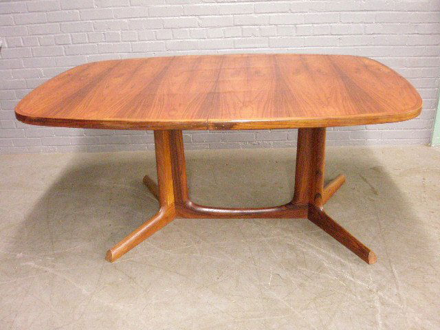 Modern Rosewood Dining Room Table: Modern Rosewood dining room table, "Made in Denmark", with 2 leaves.