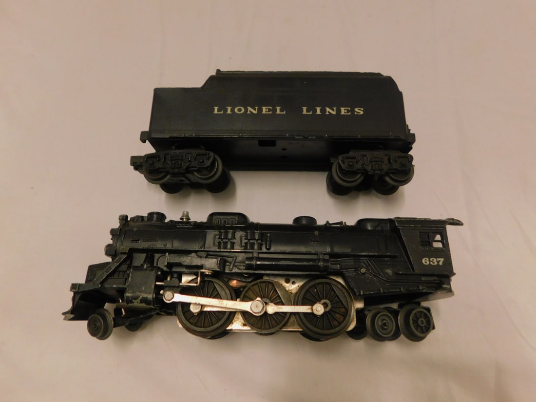 Lionel Postwar Locomotive w/Tender: Lionel Postwar Locomotive w/Tender, No. 637 with Lionel Lines Tender, untested. CONDITION: Minor wear, needs cleaning, tender missing top lever.