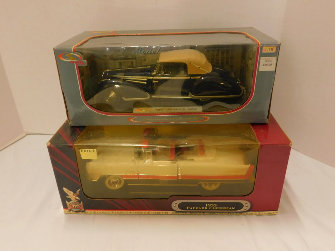 2 Signature 1:18 Die Cast Cars: Two Signature 1:18 Die Cast Cars both new old stock, in original boxes including: Signature Series 1947 Delahaye 135 M and Road Signature 1955 Packard Caribbean, vehicles, 11", boxes 5 1/4" x 6" x 14"