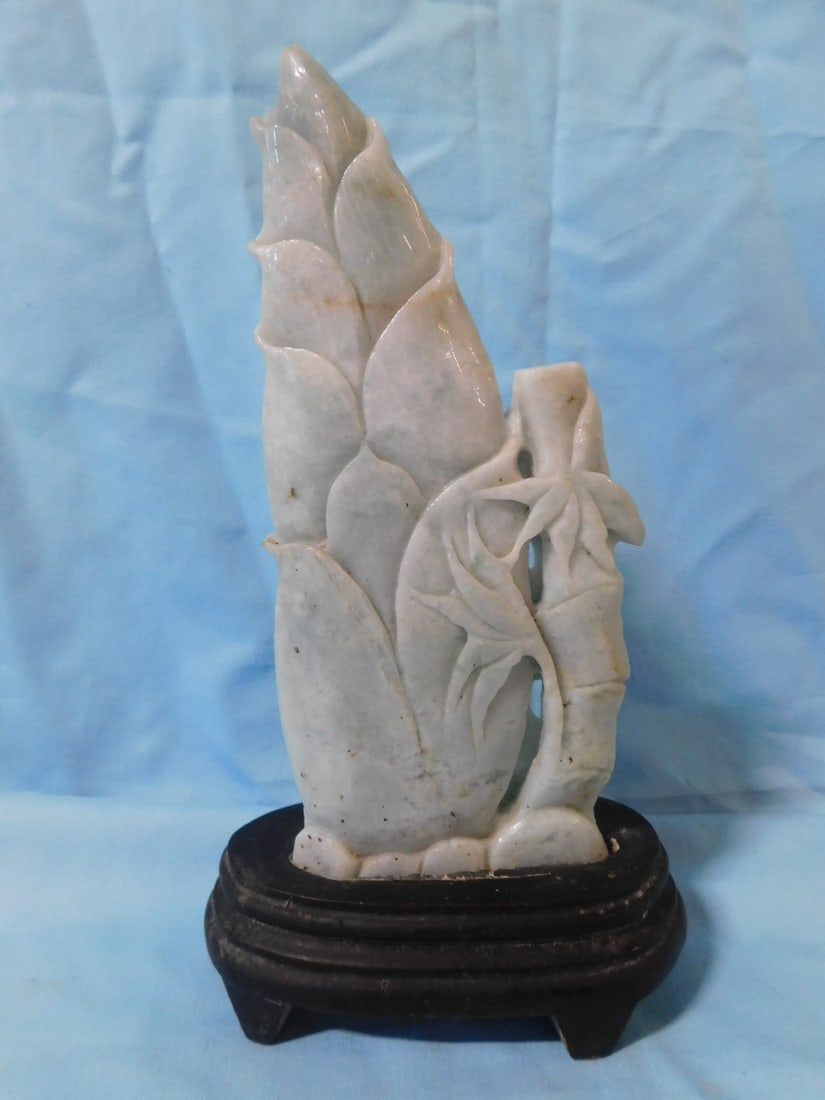 Chinese Jade Carving: Chinese Jade Carving pale green jade or serpentine carving of bamboo tree and leafy plant, fitted wood base, early to mid 20th c. hgt on base 9 7/8". CONDITION: Good, no issues noted.