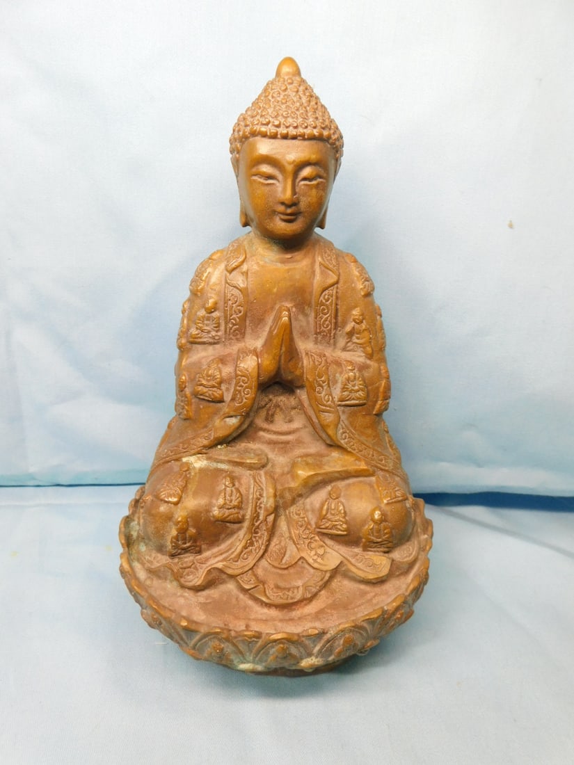 Bronze Buddha: Bronze Buddha Chinese seated buddha on lotus blossom base, cast markings on base, 20th c. hgt xxx. CONDITION: Tarnished