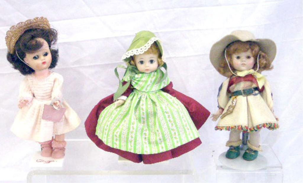 Three 1950's-1970's Dolls: Lot of three 1950's-1970's dolls, Vogue Doll Co. 7 1/2" cowgirl, Ideal Toys Co. 8" Ginger with stand & Madame Alexander 8" Denmark with stand. CONDITION: All have minor wear.