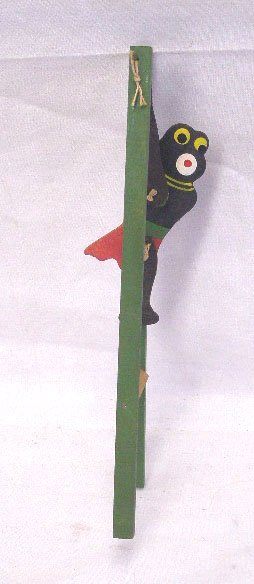 Vintage Black Americana Flip Toy: Vintage Black Americana painted wood 8 1/4" novelty flip toy, made in Japan. CONDITION: Very good with minor wear.