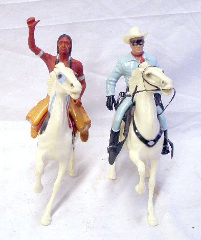 Hartland Plastics Lone Ranger & Tonto Figures: 1950's Hartland Plastics Inc. Lone Ranger & Tonto on horseback figures. CONDITION: Guns for Lone Ranger are stuck in body, no tomahawk for Tonto, both have minor wear.