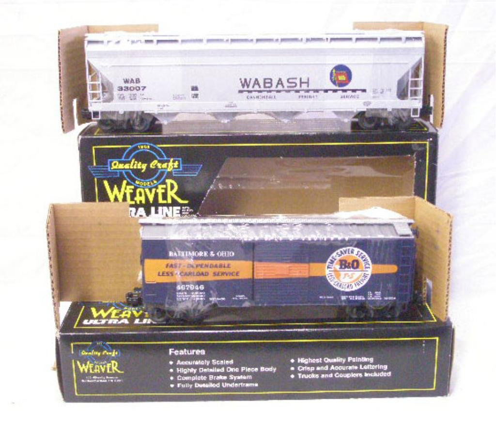 Weaver 3-Rail Trains: Lot of two Weaver Quality Craft Models 3-Rail trains with boxes, Wabash #33007 ACF Centerflow & #3088 PS-1 B&O 40' Boxcar. CONDITION: Both are very good with no damage, boxes have wear.
