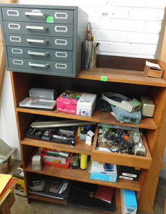 Bookcase with Contents: 5 drawer bookcase with contents, metal slide cabinet, Canon Power Shot ABS digital camera, office supplies, cartridges, etc. Condition: very good