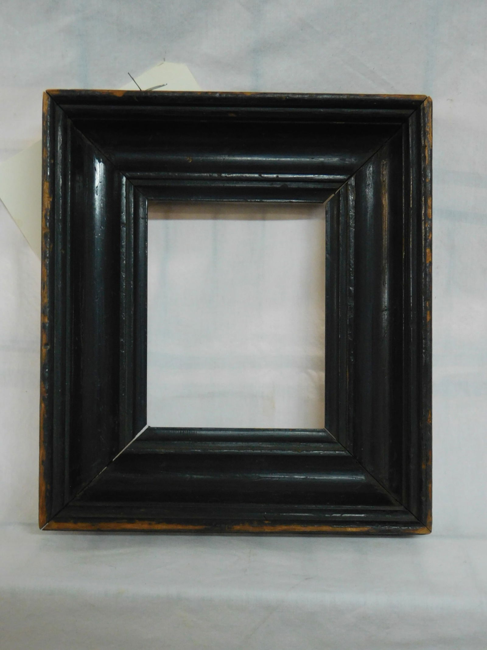Antique Small Frame: Antique Small Frame, ebony finished wood ogee molded deep frame, 7 3/8" x 8 3/8"; interior 7 1/4" x 8 1/4", depth 2". CONDITION: Finish wear on edges.