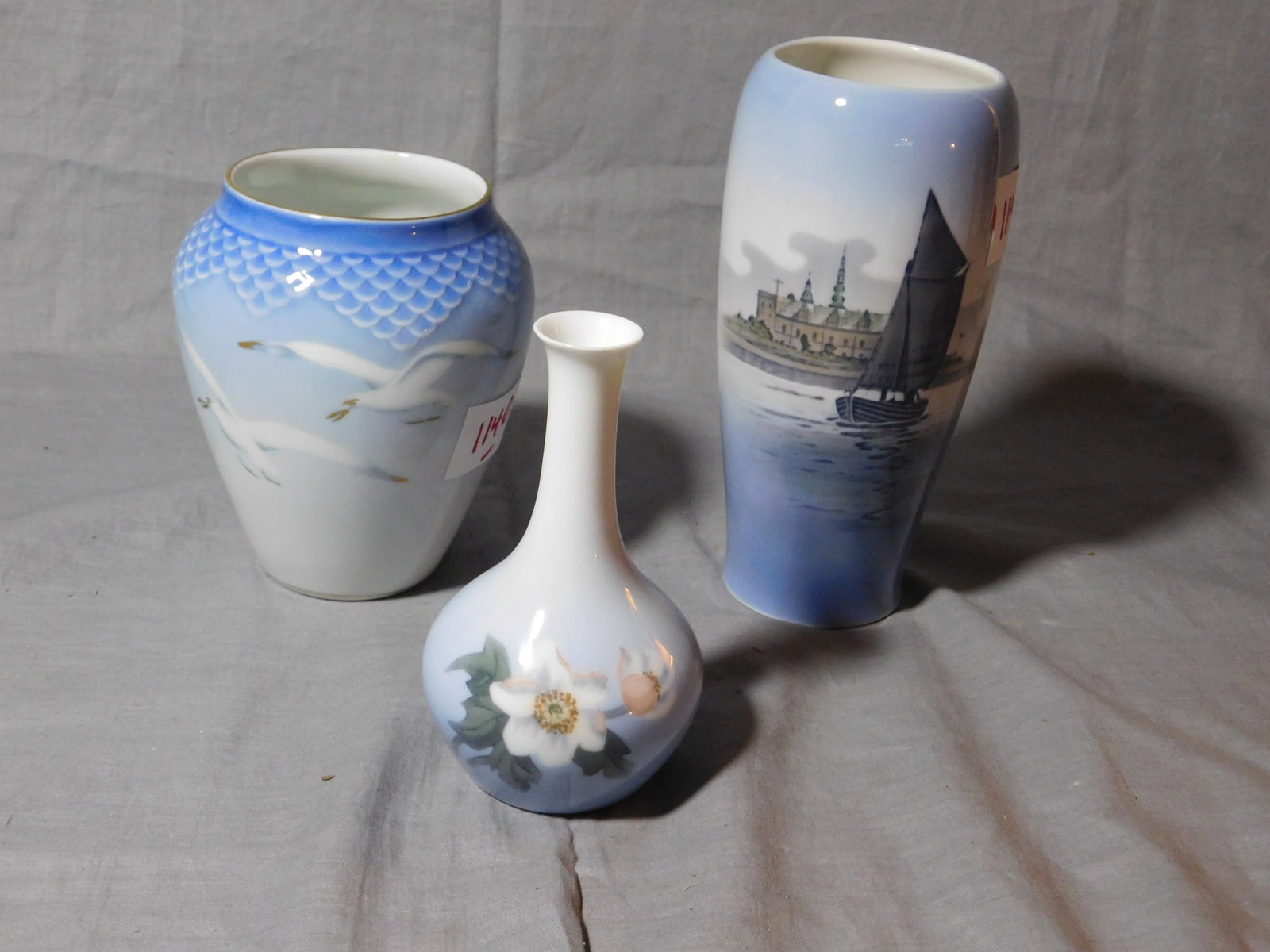 3 Royal Copenhagen / Bing & Grundle Vases: 3 Royal Copenhagen / Bing & Grundle vases, with birds, ships and flowers, from 5" - 7". Condition: excellent