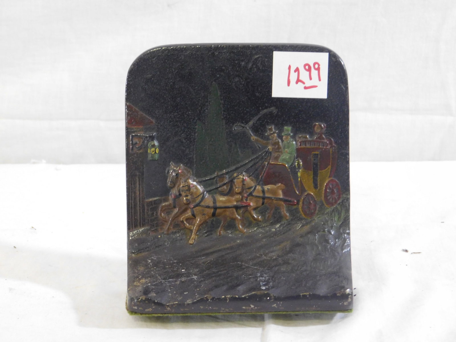 Cast Iron Door Stop: cast iron door stop with painted carriage scene, 5" x 5 1/2"> Condition: minor wear from age