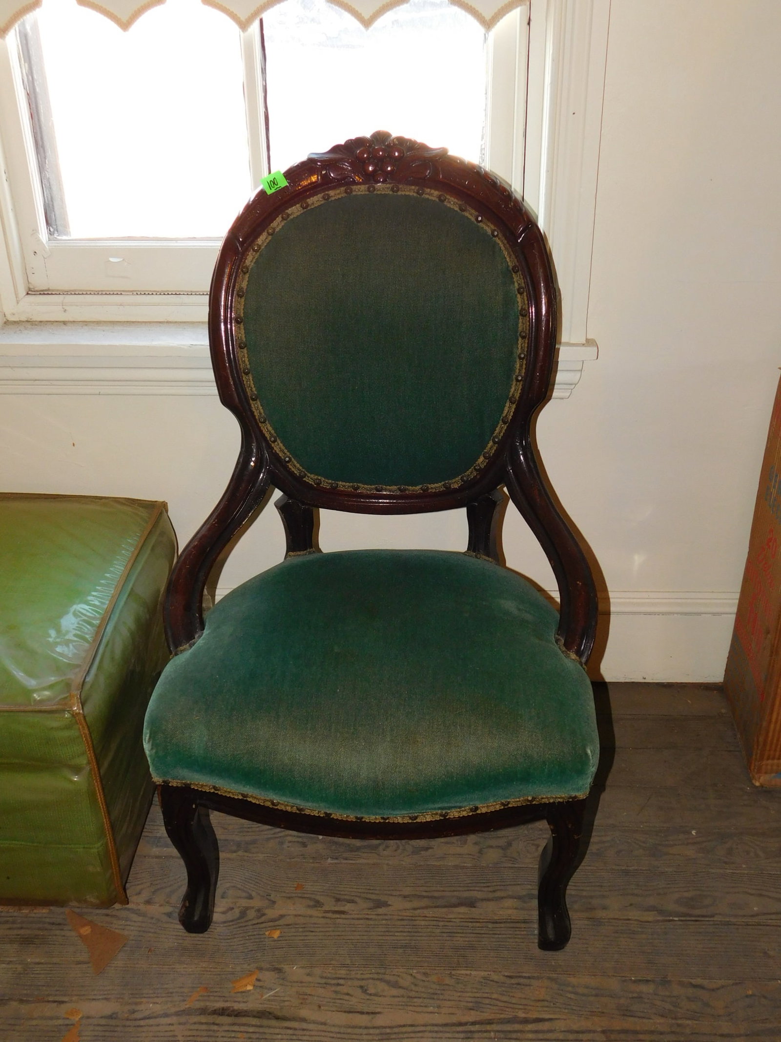 Rococo Revival Hip Rest Chair: Rococo Revival hip rest chair, walnut, green velour upholstery, grape carved crest. late 19th c. Condition: over varnished