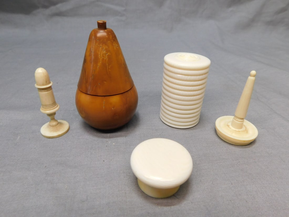 5 Game Items, etc.: Five Game Items, etc, includes: a 2 3/4" h ring turned covered jar with seventeen game chips; a 1 1/8"d covered jar with removable dog bone carving; a Tagua nut turned pear shaped jar containing eight