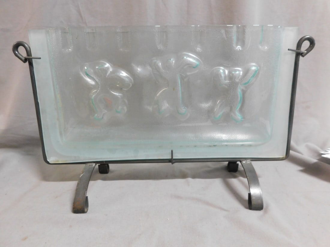 Studio Glass Planter: Studio Glass Planter green tinted textured & frosted molded glass planter, each side with 3 puffy dancing figures, rest in a fitted & footed wrought metal frame, 21st c. 19 1/2" x 11 1/2" x 6". CONDIT