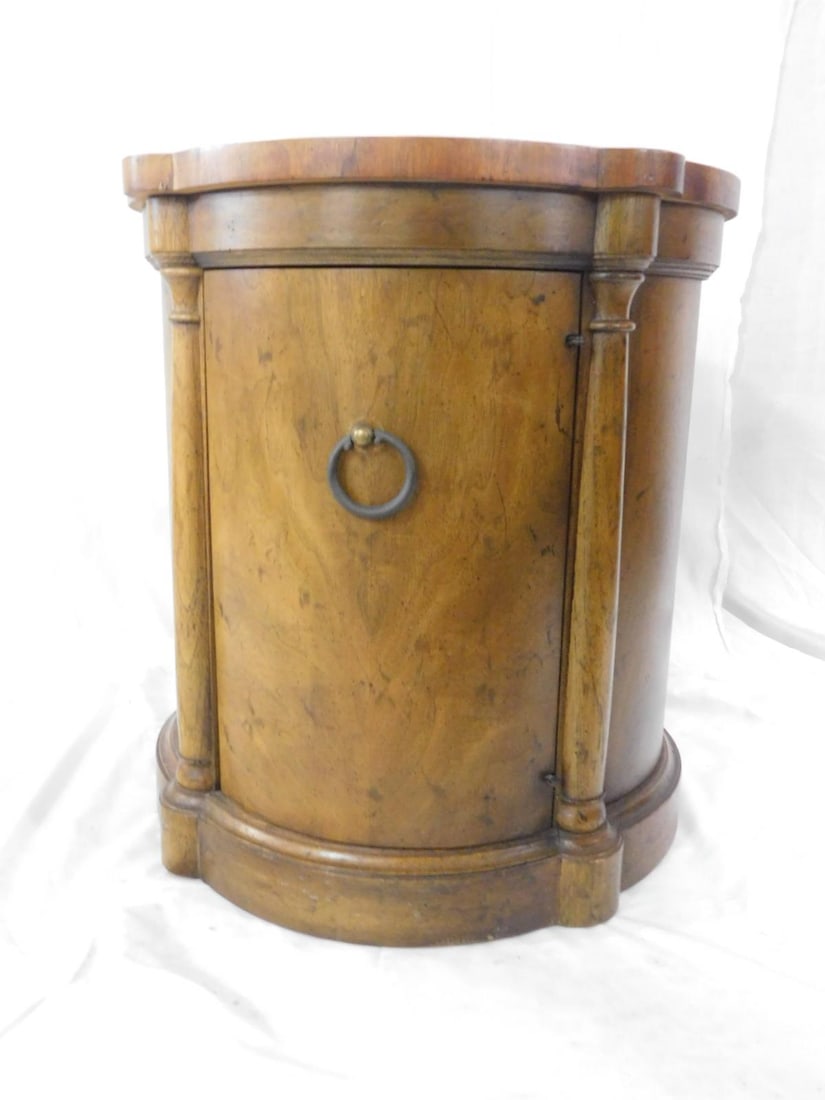 Drum Table: Drum Table, Fruitwood, modified drum form with turrets, columns and single door, late 20th C, 20 3/4"d, 22 1/2"h. CONDITION: Good, a few dings and scratches.