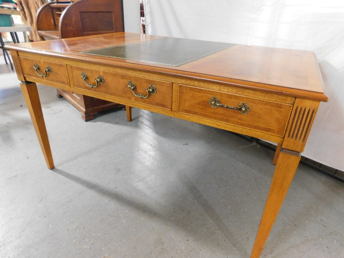 Hepplewhite Style Library Table: Hepplewhite Style Library Table, bench made, light flame grained and banded mahogany, partial green tooled leather top over three locking drawers, verso with faux drawers, tapered square legs, mid 20t
