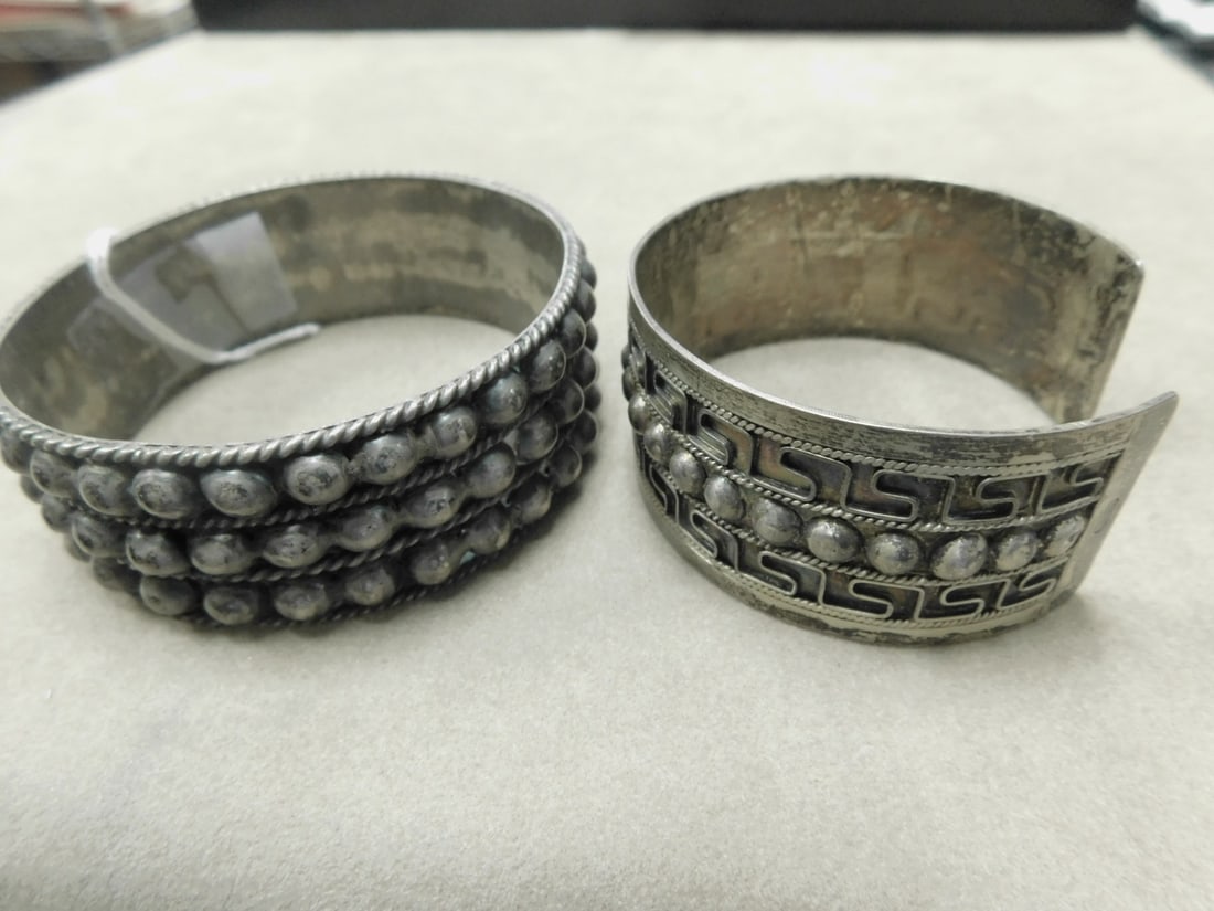 Silver Cuff and Bangle Bracelets: Silver Cuff and Bangle Bracelets, 1"w bangle marked made in Mexico and silver, three rows beads. 1"w cuff is unmarked, bead and Greek key design, 2 1/4", inside across, 1" opening. 2.76 ozt Total. CON