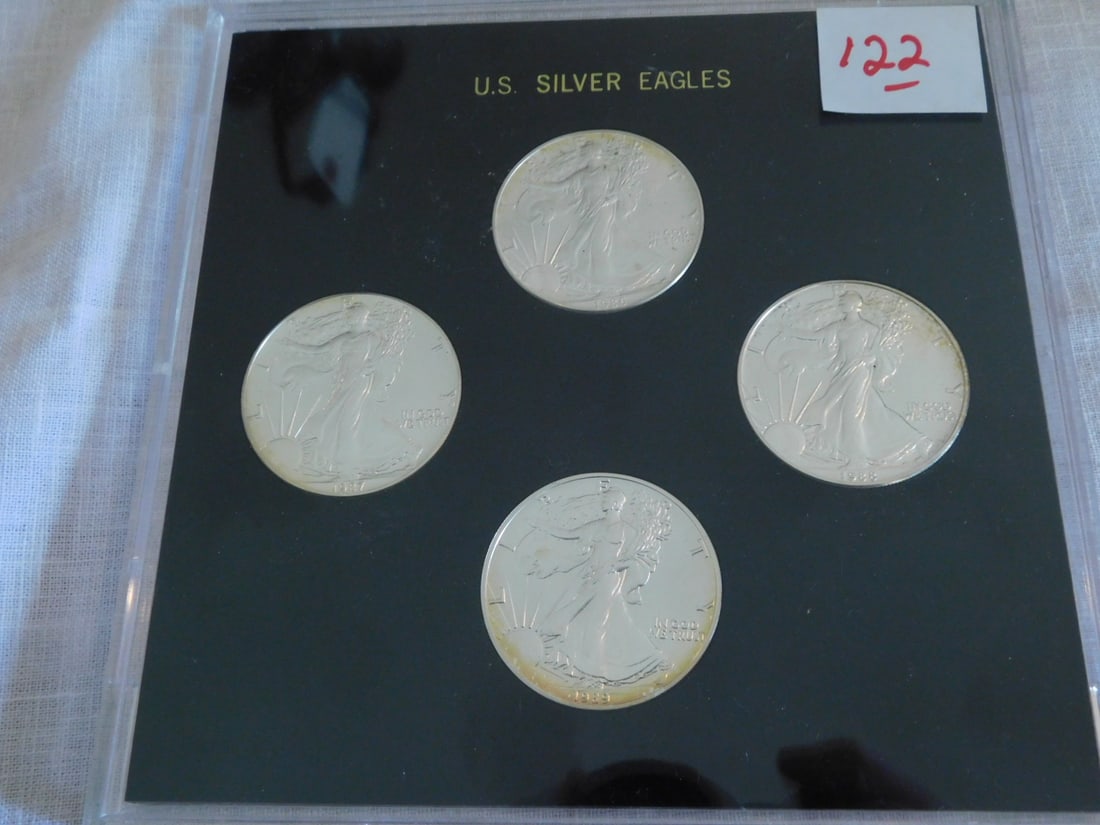 Set (4) U S silver Eagle $1 coins (1 of 2)