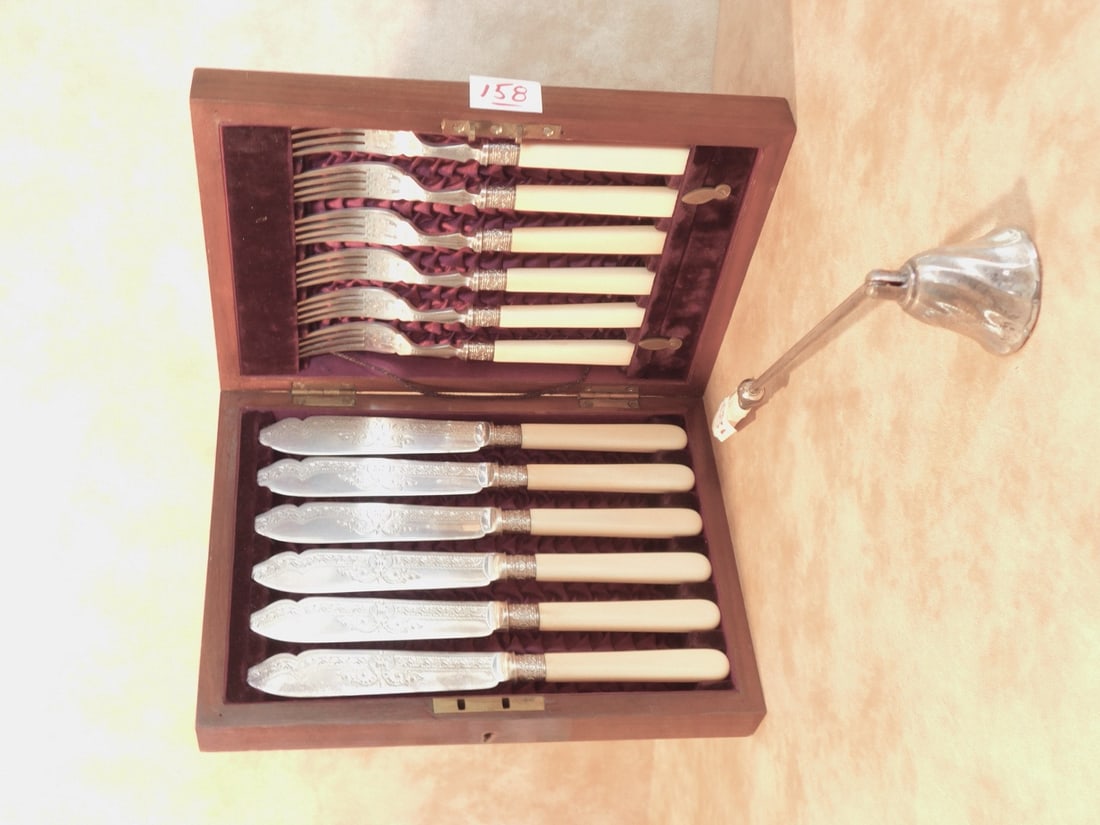 English bone handle fish set: English bone handle fish set, engraved blades, MHS makers touch mark including: (6) forks and (6) knives, in custom solid walnut case 10 1/4" x 7 3/8" x 2 1/4". plus bone 12" handle candle snuffer Con