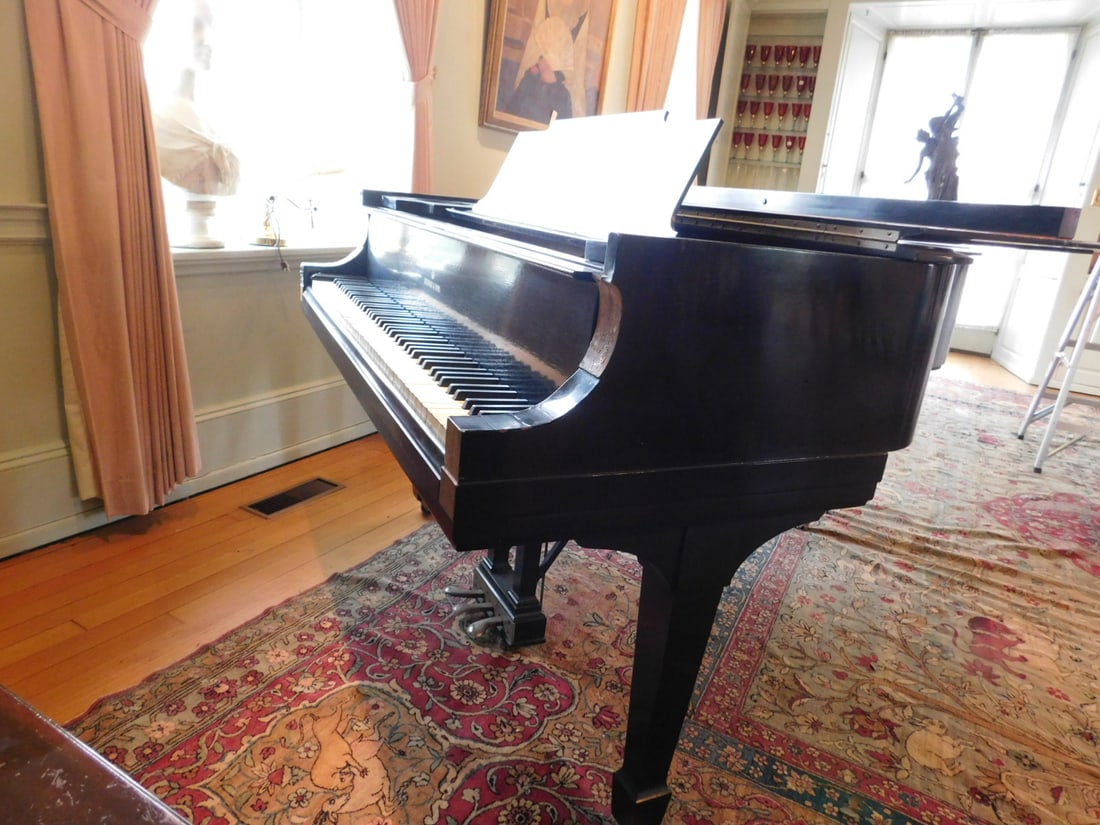 Steinway & Sons Baby Grand Piano: Steinway & Sons Baby Grand Piano, black lacquered finish, 12/1.M #162, approx. 68" l. Condition: areas of veneer loss, sound board appears to be very good, needs major tuning, all keys working, one ke