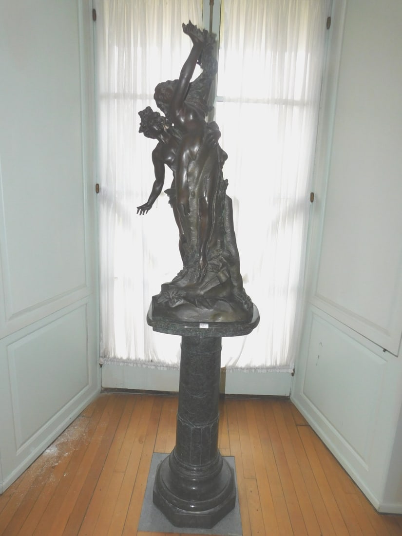 Bronze sculpture on marble pedestal (1 of 9)