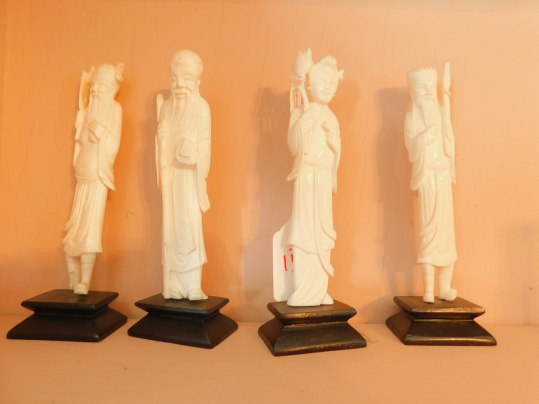 4 Chinese Immortal carvings: 4 Chinese Immortal carvings, standing 6" figures on wood bases, 19th / 20th c. Condition: one missing portion of foot (can't stand) Note: no out of state or international shipping