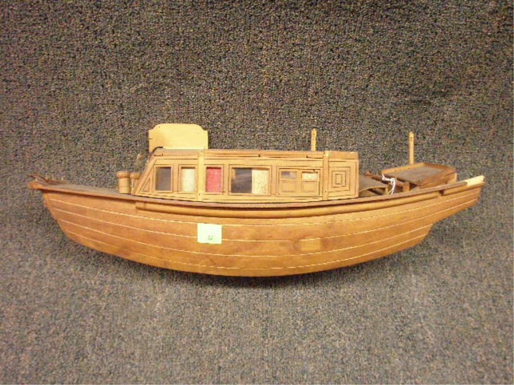 Vintage Oriental Boat Model: Vintage Oriental (probably Chinese) wood boat model, early 20th c. 25"=max. length. [Provenance: From the collection of the former Commercial Museum, Philadelphia (later the Civic Center Museum)]. CON