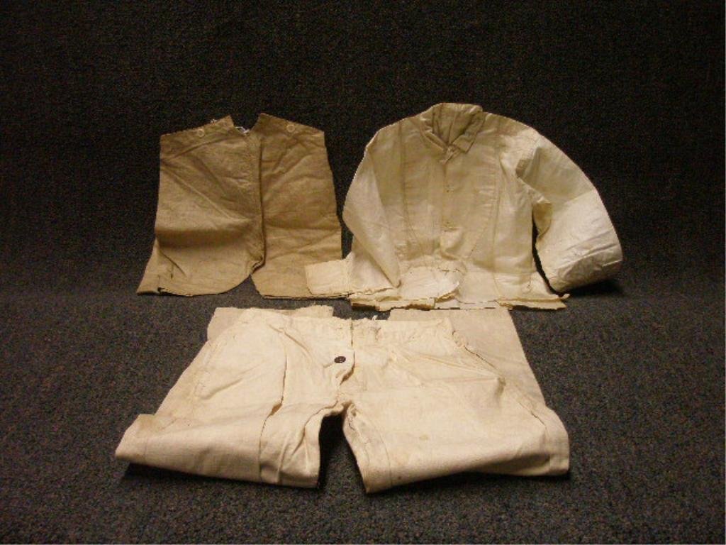 French Caribbean Child's Linen Clothing: [3 pieces] Boy's linen clothing, to include: 2 pairs, pantaloons; shirt with full sleeves, (apparently) Martinique, early 19th c. [one pair of pants retains faded manuscript paper label. Provenance: F